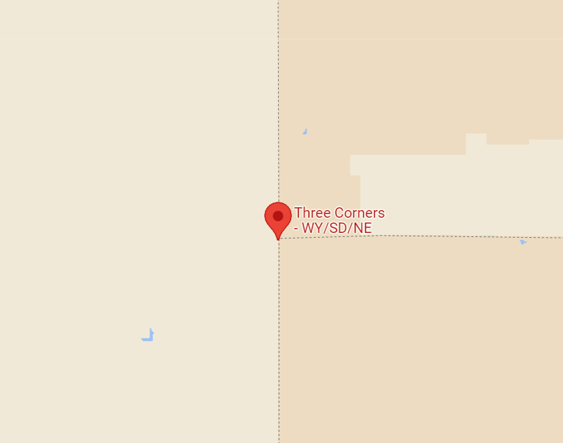 The Wyoming-South Dakota-Nebraska tripoint on Google Maps. It's on land.