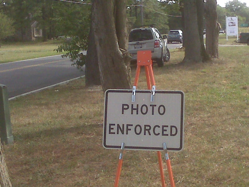 The picture is looking south along North Division Street in Fruitland, north of the intersection with Cedar Lane - the directional sign for the roundabout is visible in the background. It appears the warning sign is well off the travel lanes. The photo taker wishes to remain anonymous.