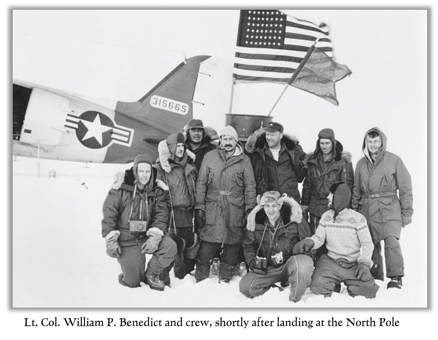 William Benedict and his crew at the North Pole.  His plane is in the background, as is the American flag and Air Force banner that they planted.