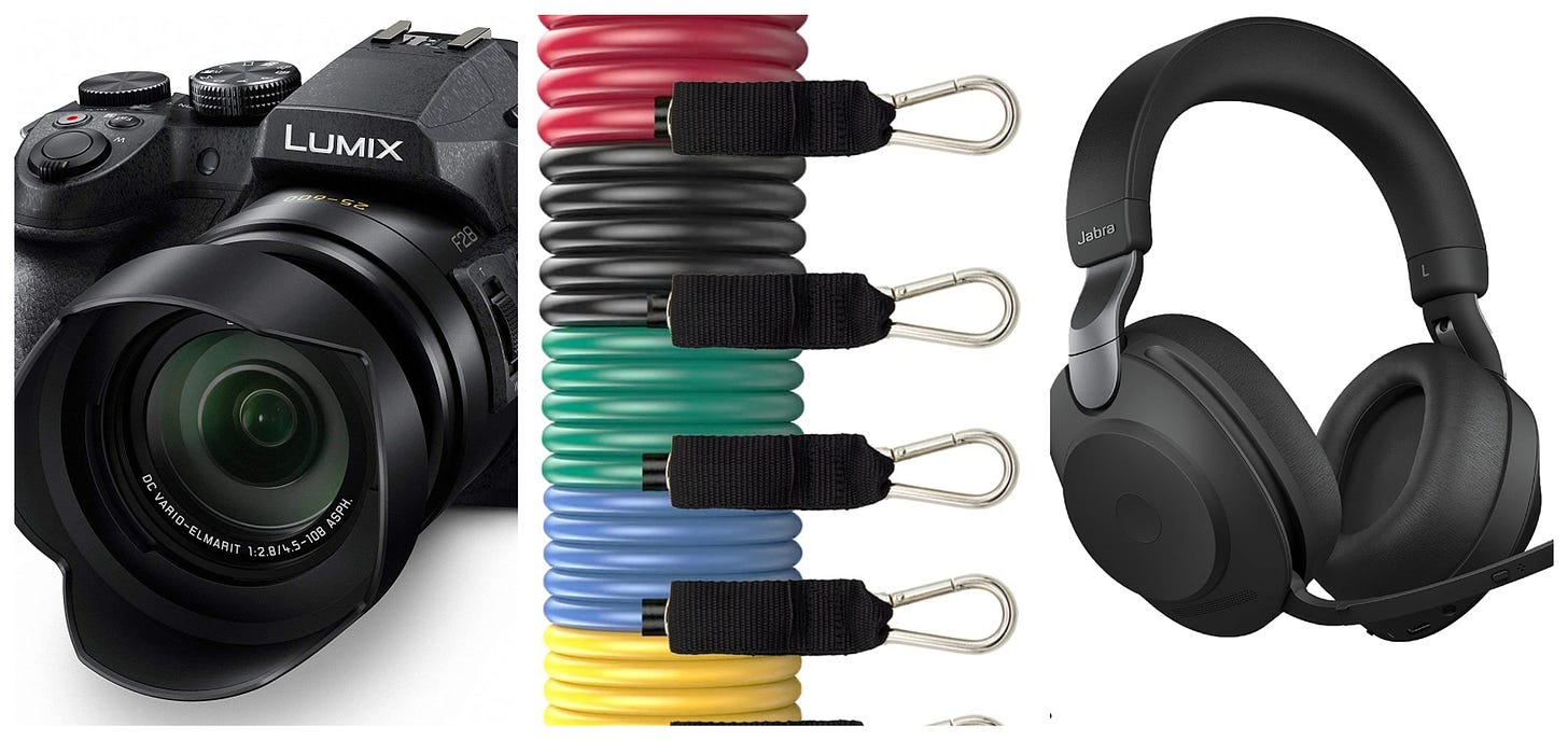A Lumix camera, Black Mountain resistance bands, and Jabra headphones.