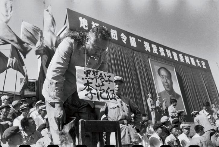 A provincial governor in Heilongjiang has his hair brutally shaved and is forced to bow for hours after being accused of bearing a resemblance to Mao Zedong.