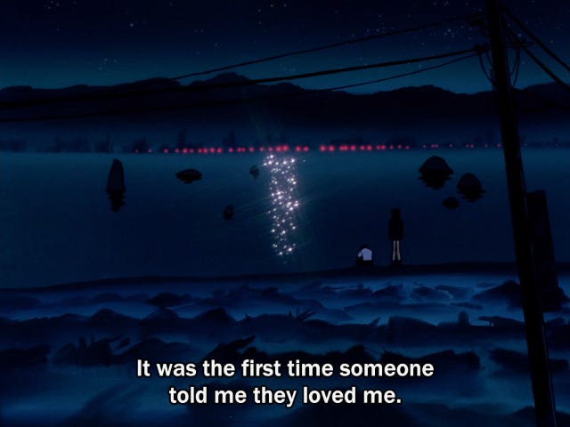 Shinji sitting on the shore where he met Kaworu, now at night with Misato.