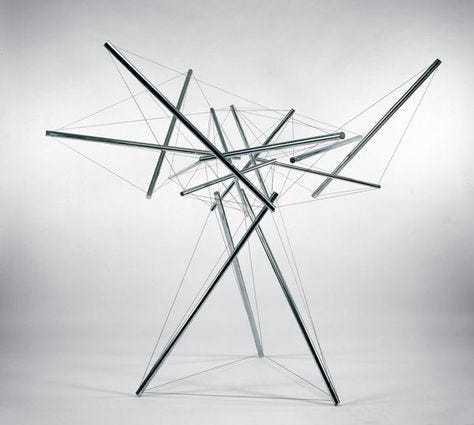 A Tensgrity structure is able to hold itself up despite its appearance, due to a rich interrelation of its parts.