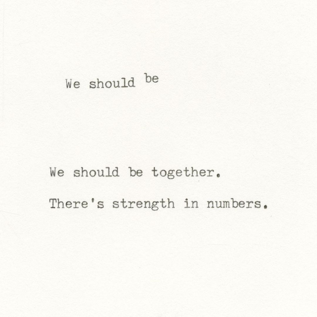 Black text on a white background reads: "We should be / We should be together. / There's strength in numbers."