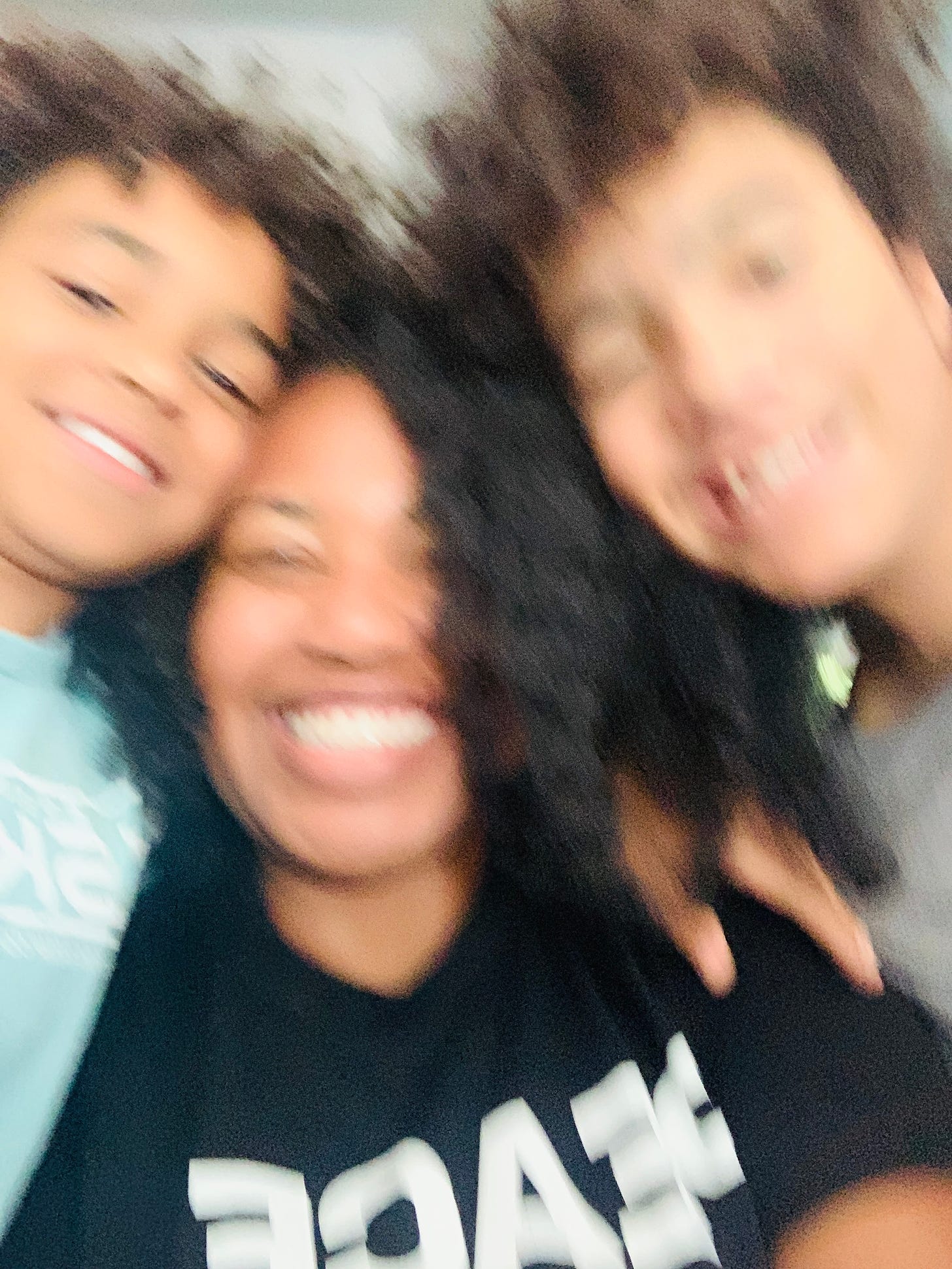 A blurry picture of me and my sons