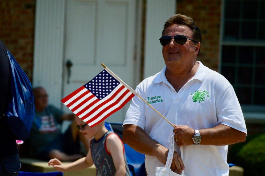 Mokena Trustee George Metanias hands out candy during the parade.