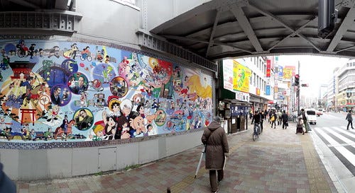 Tezuka Productions mural in Takadanobaba, Tokyo. From Love Tokyo's Otaku Culture? Read this.
