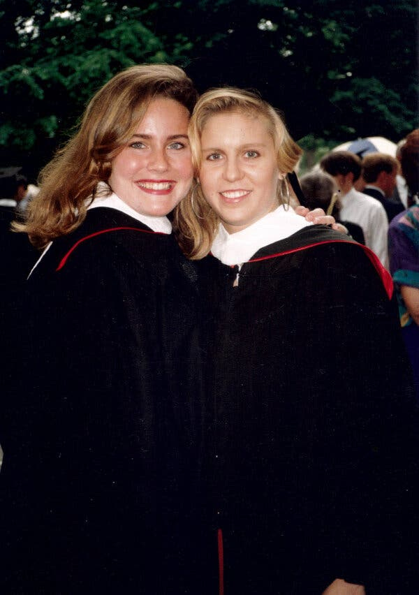 Judge Barrett with Shannon Papin, a former roommate, at their graduation from Rhodes College in 1994.