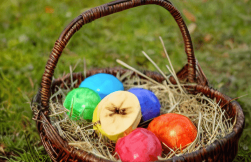 Picture of an Easter egg basket with the yellow egg replaced by a banana slice