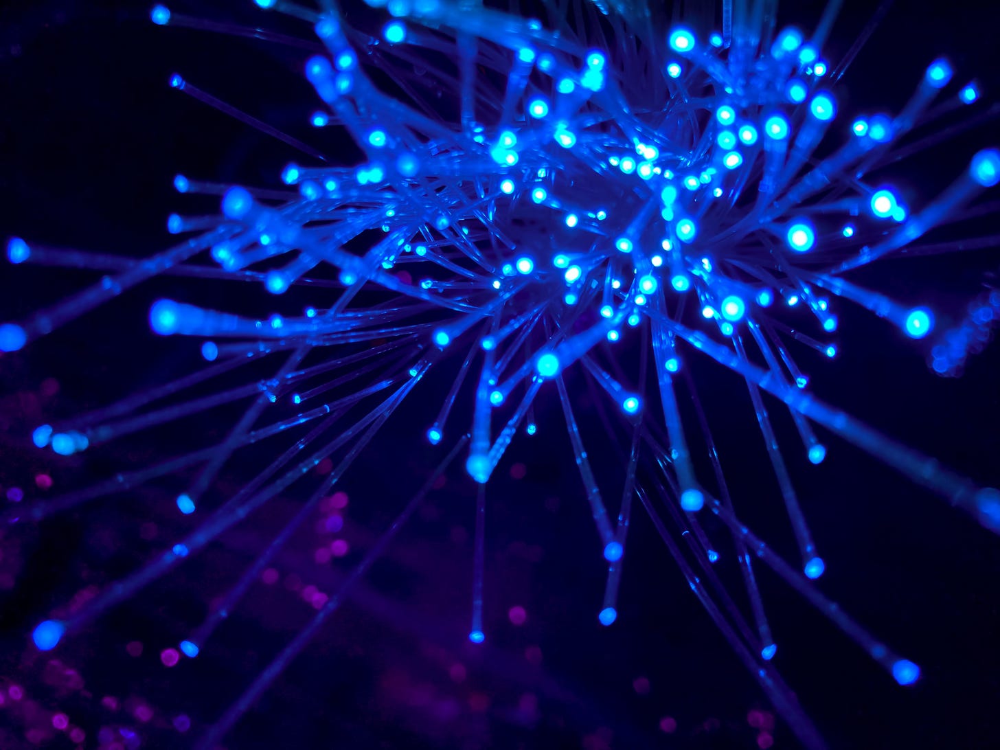 Illustration showing blue nodes in a network. (JJ Ying on Unsplash)