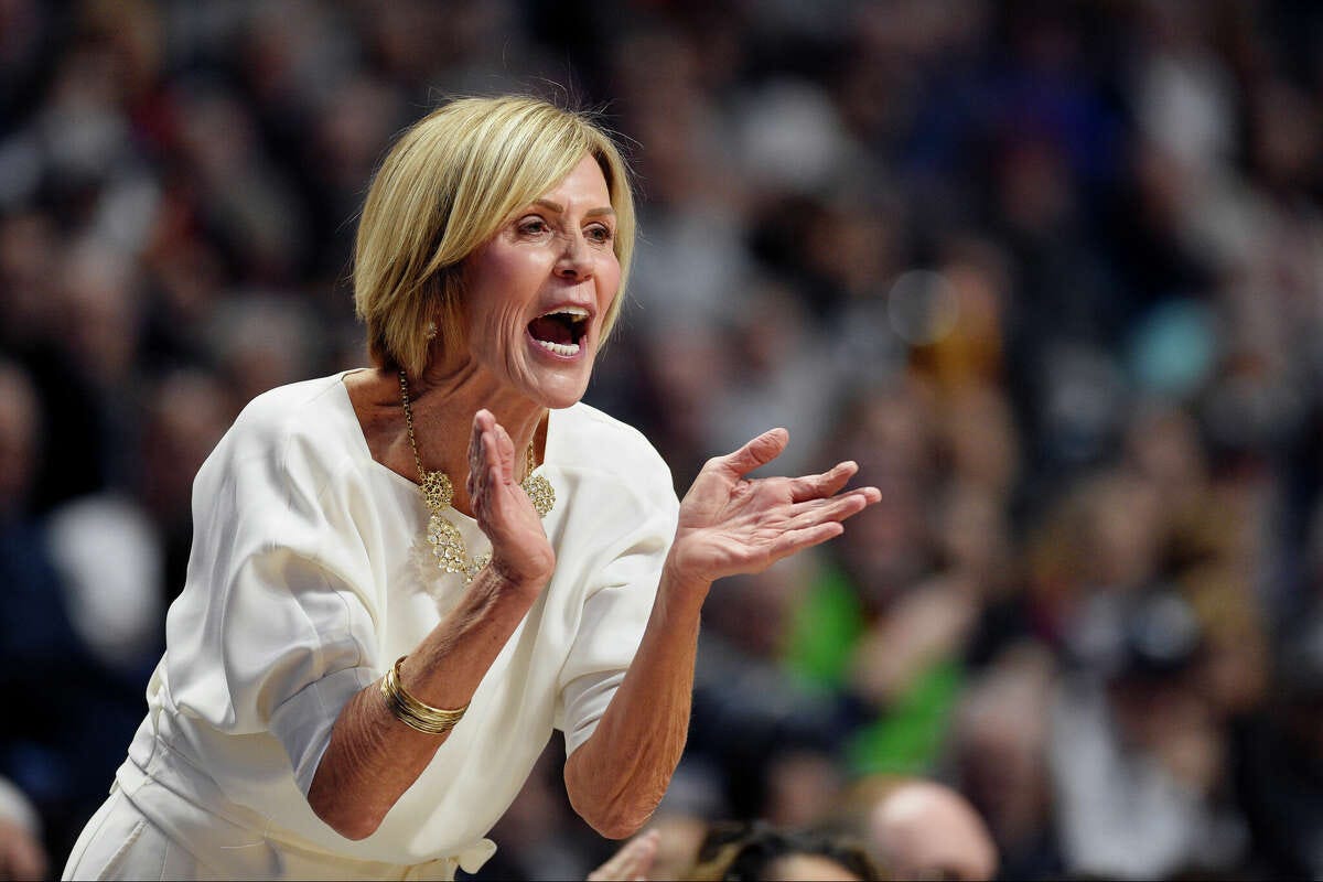 Connecticut associate head coach Chris Dailey calls to her team in the first half of an NCAA college basketball game against Oklahoma, Sunday, Dec. 22, 2019, in Uncasville, Conn. 
