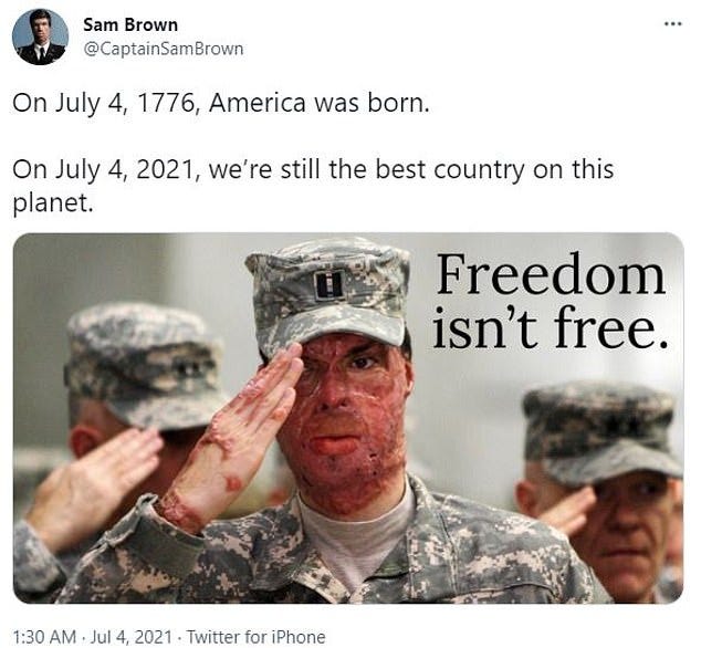 A veteran badly burned in an Afghanistan IED blast has slammed Twitter for flagging his July 4 post of him saluting in uniform as 'potentially sensitive content' (the tweet above)