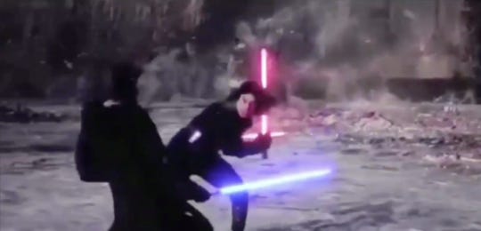 mid-fight, with luke and kylo dodging around each other