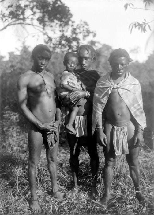 Three maroon men in Suriname, between 1910 and 1935. Courtesy Wikimedia Commons.