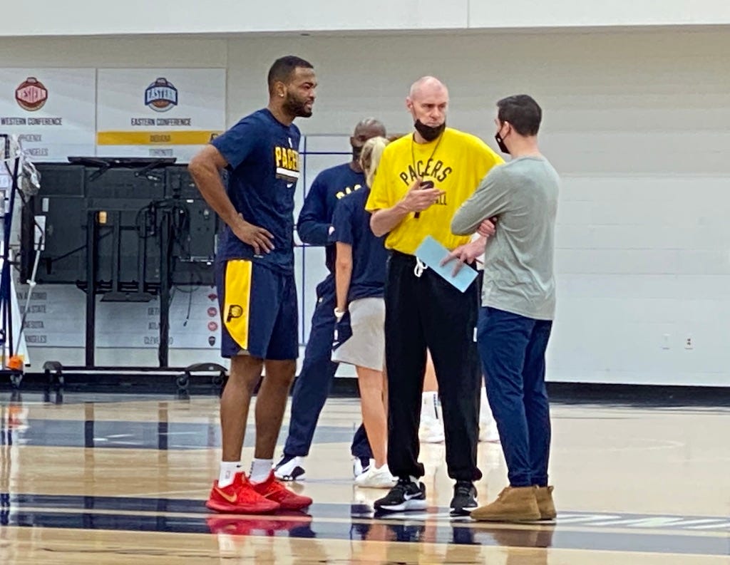 Pacers head coach Rick Carlisle with T.J. Warren and T.J. McConnell at practice.