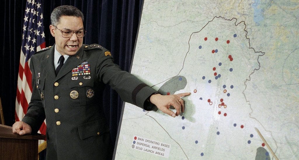 May be an image of 2 people, people standing, map and text that says '1 MAIN SCUD DISPERSAL OPERATIN NGA BASES LAUNCH AREAS'