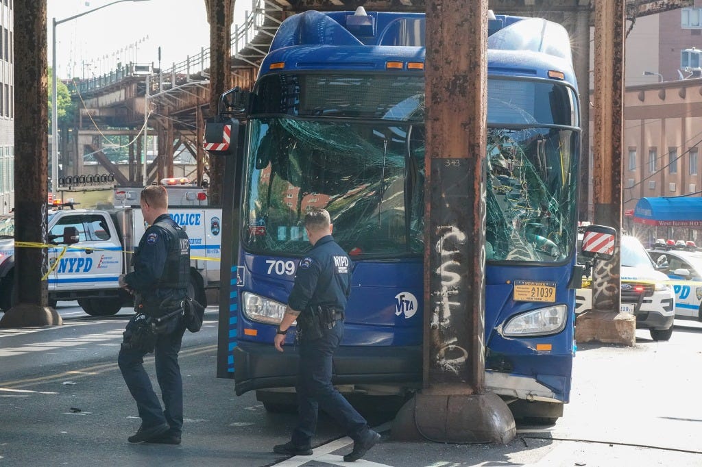 The front of the MTA bus rammed into the pole, shattering the window.