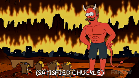 Ned Flanders as the devil laughs in hell during the Heck House segment of the Simpsons Treehouse of Horror XVIII