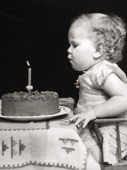 Baby Girl One Year Old Blowing Out Candle on Birthday Cake' Photographic  Print - H. Armstrong Roberts | AllPosters.com
