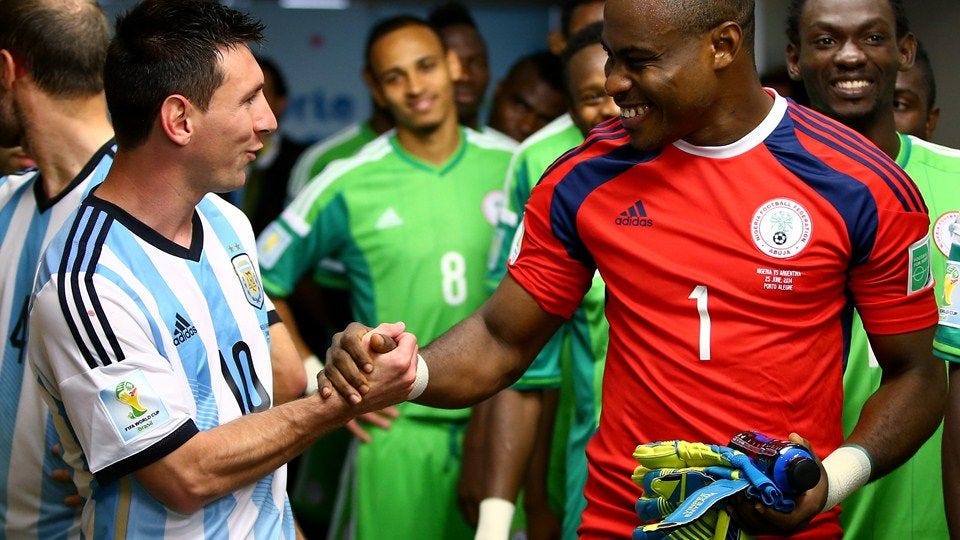 Lionel Messi and Vincent Enyeama of Nigeria shake hands in the tunnel ...