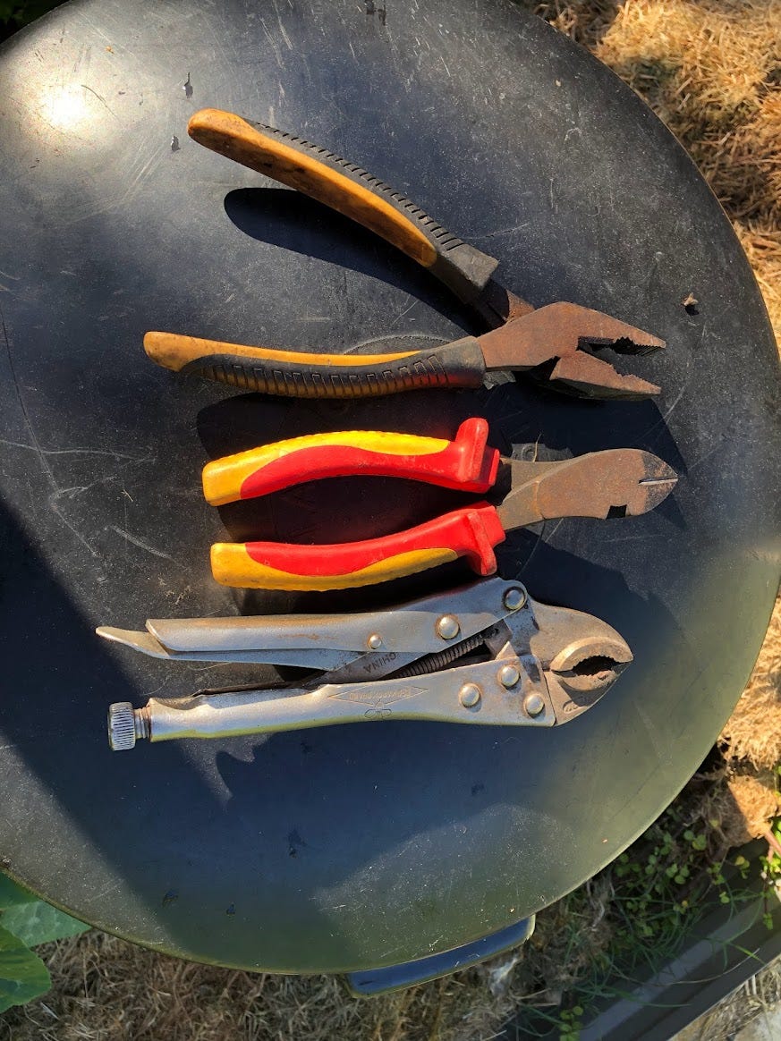 pliers, wire cutters and vice grips
