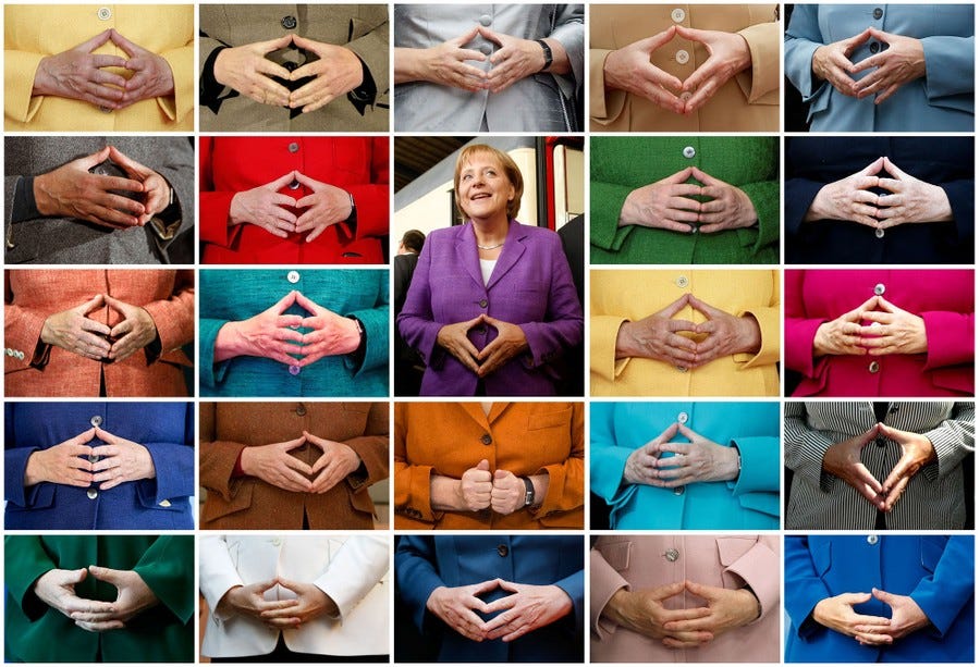 Many images of German Chancellor Angela Merkel holding her hands in front of her body. In the majority of the images, her hands form a diamond shape.