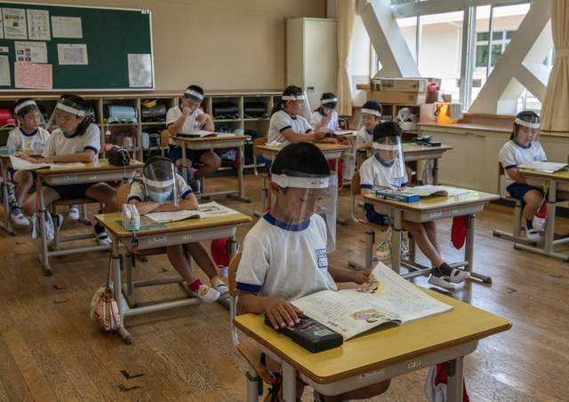 School children in Japan wearing visors as a precaution against Covid. Hugh McCarthy asks: 'Can learning take place in an atmosphere of anxiety?'