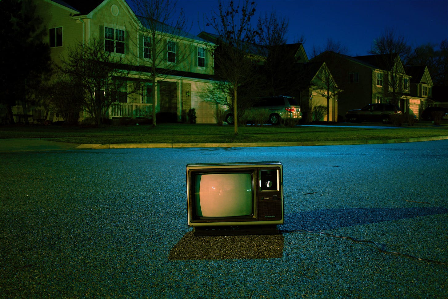 turned off vintage CRT television on road photo