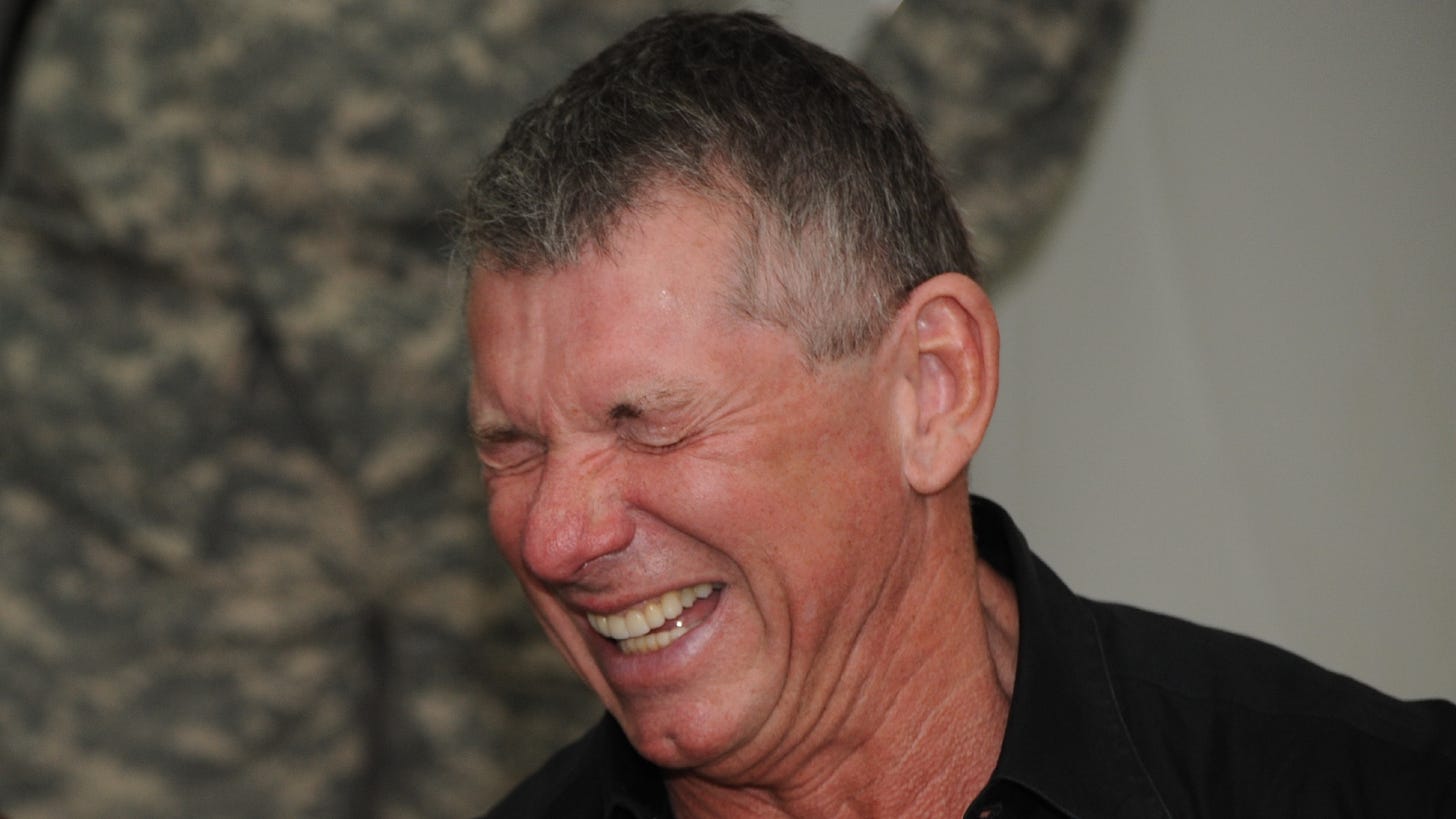 It's that photo of Vince McMahon and R-Truth laughing during a USO trip, just cropped to show only Vince. (Photo by U.S. Army Staff Sgt. James Selesnick)