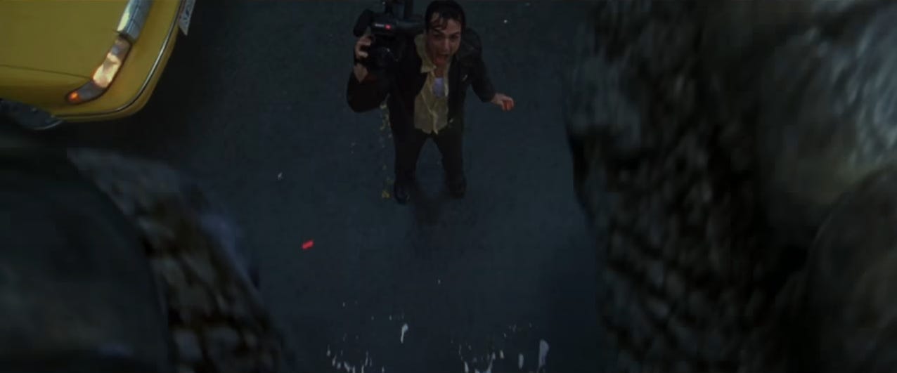 Hank Azaria's news cameraman character, screaming in fright as Godzilla's foot comes within inches of his body. From the 1998 film 'Godzilla'