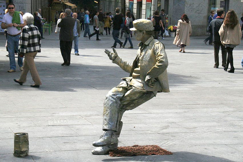 Madrid street performer pretends to be sculpture •Living in an Age of Performativity • The Whole 'Nuther • Robert Rubin • Performance becomes politics 