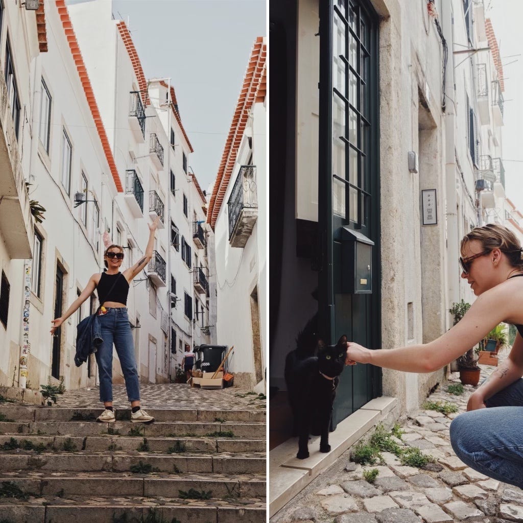 Leah on the streets of Lisbon petting a cat.