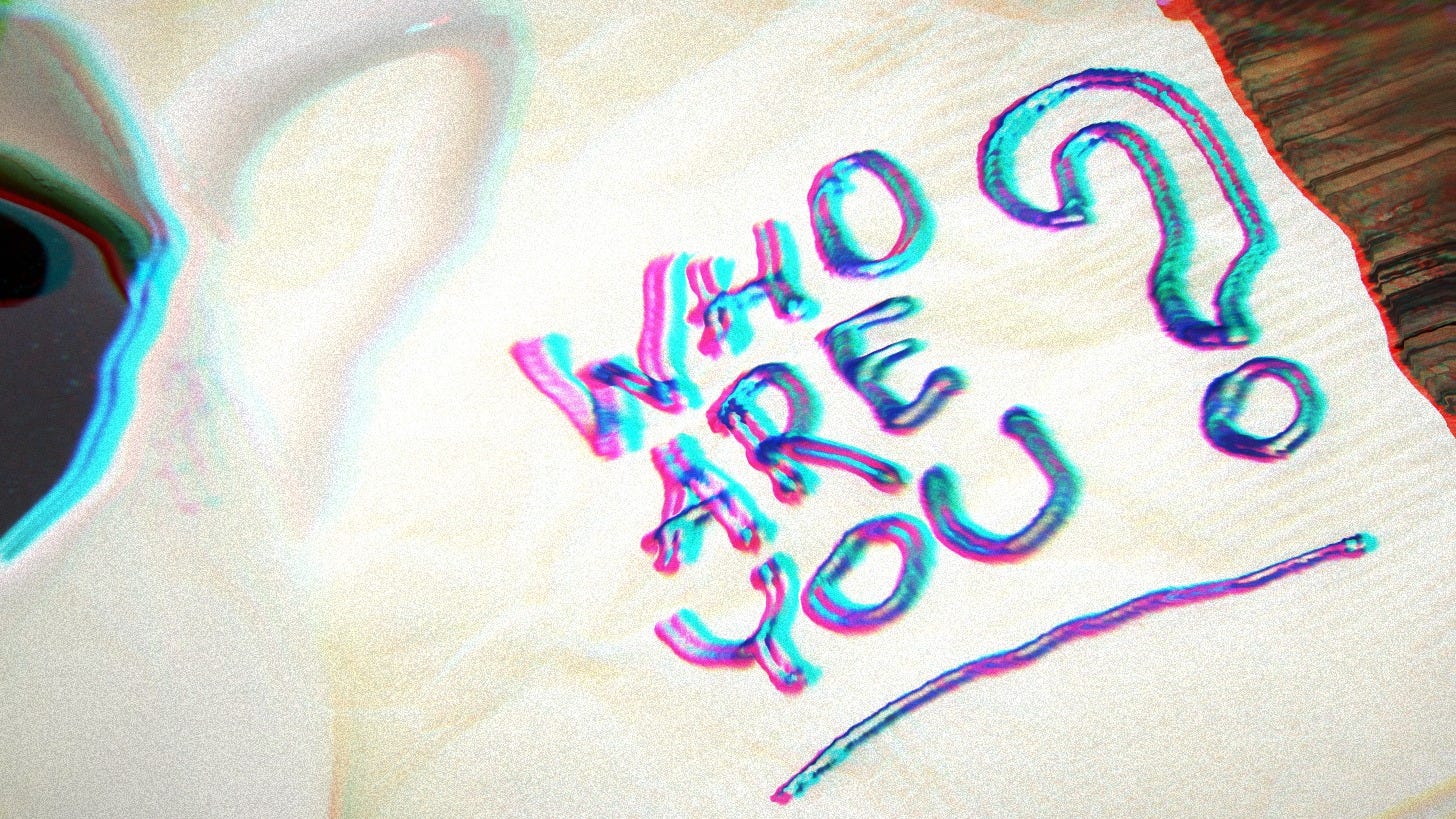 Rainbow writing on a napkin that says Who Are you? 
