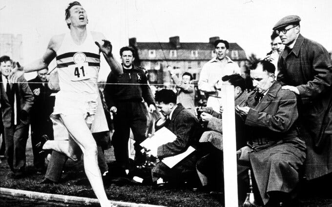 Roger Bannister breaks the four-minute mile, May 6 1954