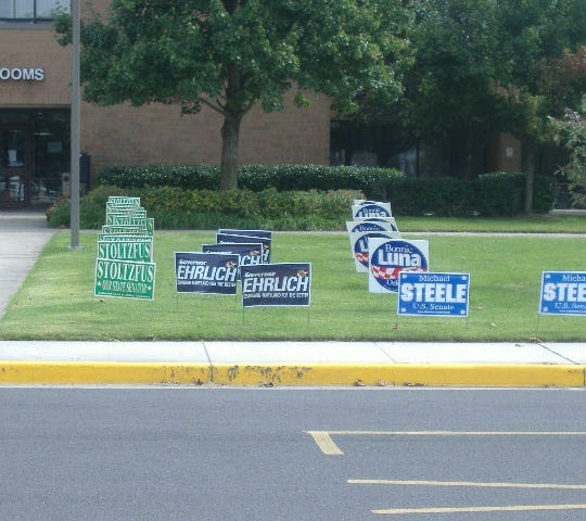 Signs in a nice geometric march.