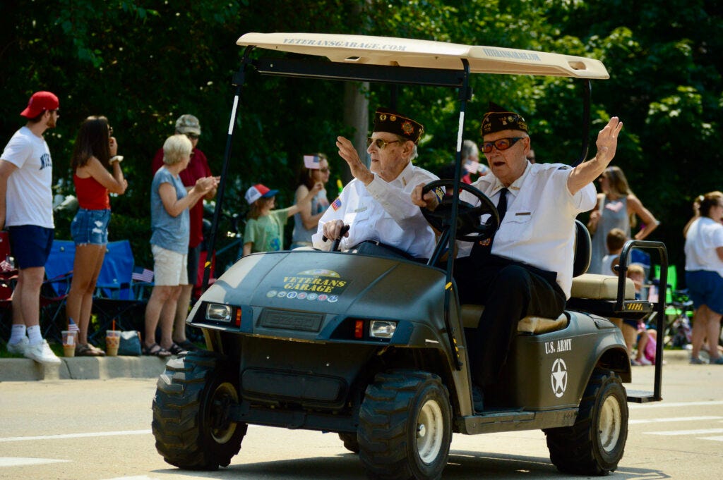 Veterans like Ray McClory (left) turned out to participate in the annual Fourth of July Parade.