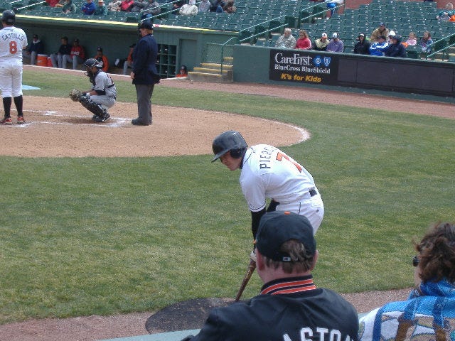 On deck, Michael looks back to the dugout during a May game.