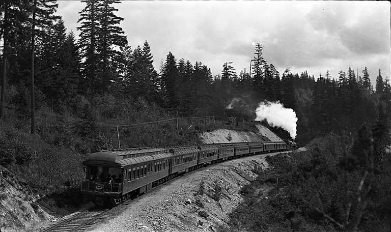 File:"The Olympian" train (Chicago, Milwaukee & Puget Sound Railroad Number  16), 2 miles east of Maple Valley, Washington, after late (WASTATE  3402).jpeg - Wikimedia Commons