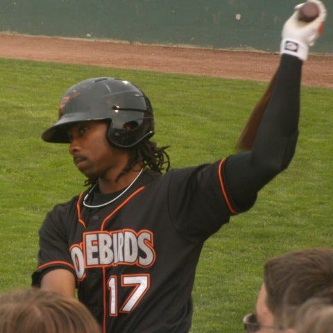 Kieron Pope loosens up before stepping to the plate for the first time against Lakewood on May 28.