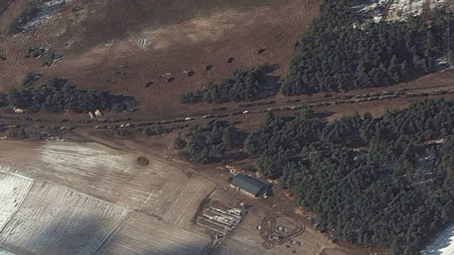 Maxar closeup satellite imagery of resupply trucks and probable multiple rocket launch deployment Berestyanka, northwest of Kyiv, on March 10, 2022.