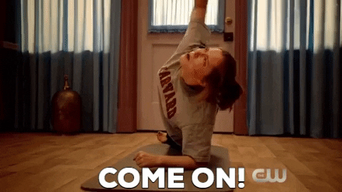 Rachel Bloom on a yoga mat yelling "Come on!"