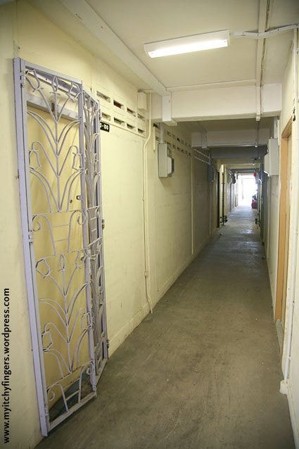 Common corridor for a block of HDB 1-room flats.