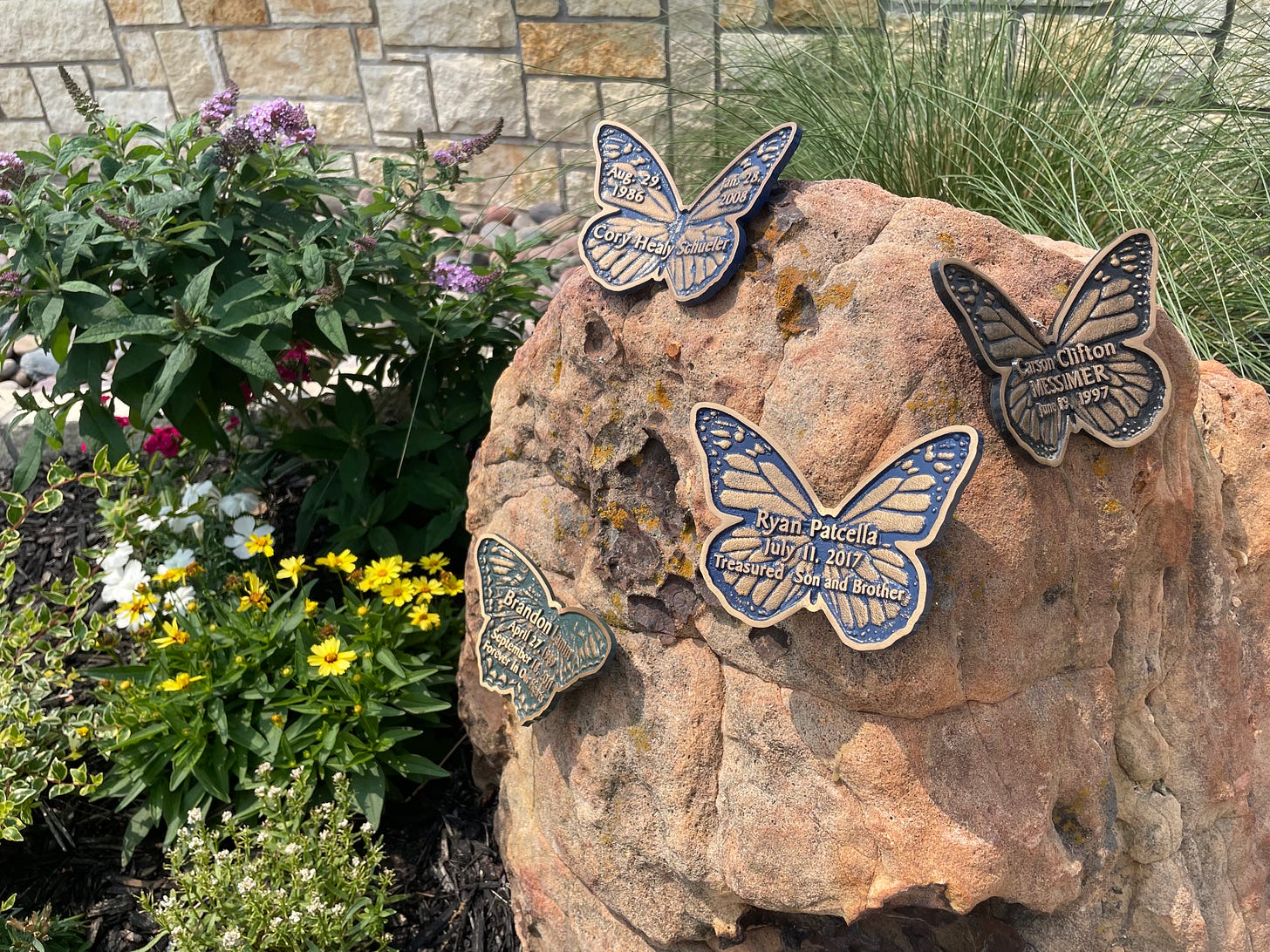 Butterfly sculptures bearing the names of deceased children