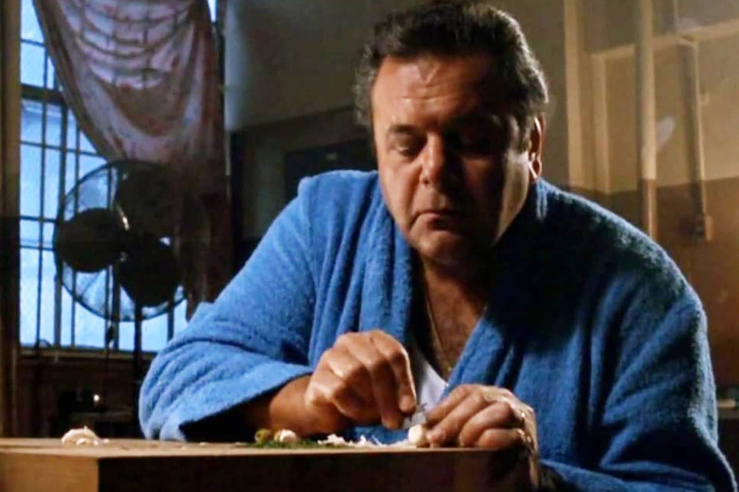 Paul Sorvino slicing garlic with a razor blade in Goodfellas was the most  mobster scene of them all | British GQ