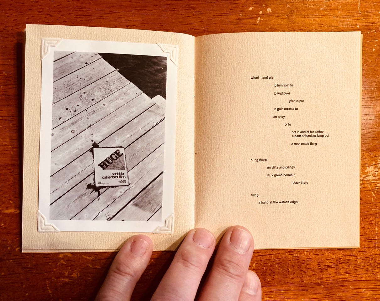 Excerpt from huge with photograph of book on wooden dock.