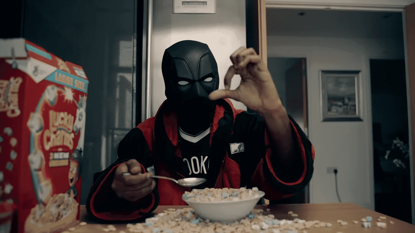 V9 in his music video for the song “Right or Wrong”, where he dons his trademark face covering like many other drill rappers who wish to conceal their identity. 