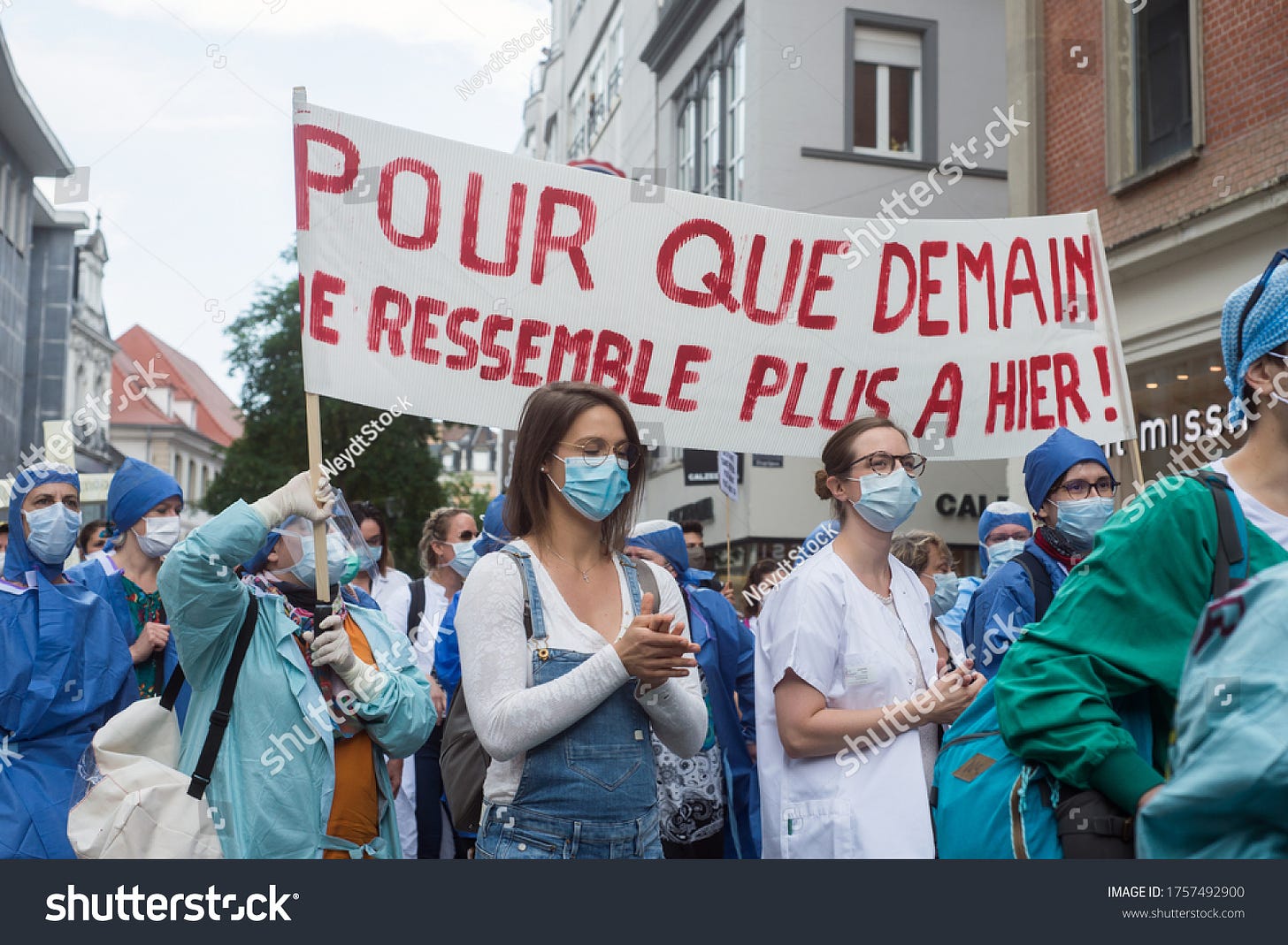 Mulhouse - France - 16 june 2020 - people protesting with a medical masks in the street to have more resources for hospitals and a salary increase