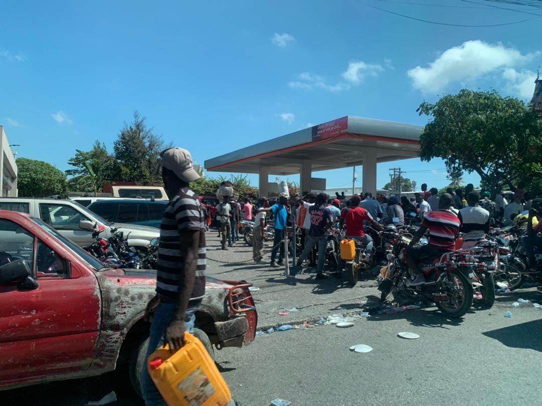 Lines of motorcycles at gasoline stations in Petion-Ville, Haiti amid recurring fuel shortages