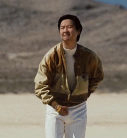 Brilliant comic actor Ken Jeong doing an exaggerated jerkoff motion