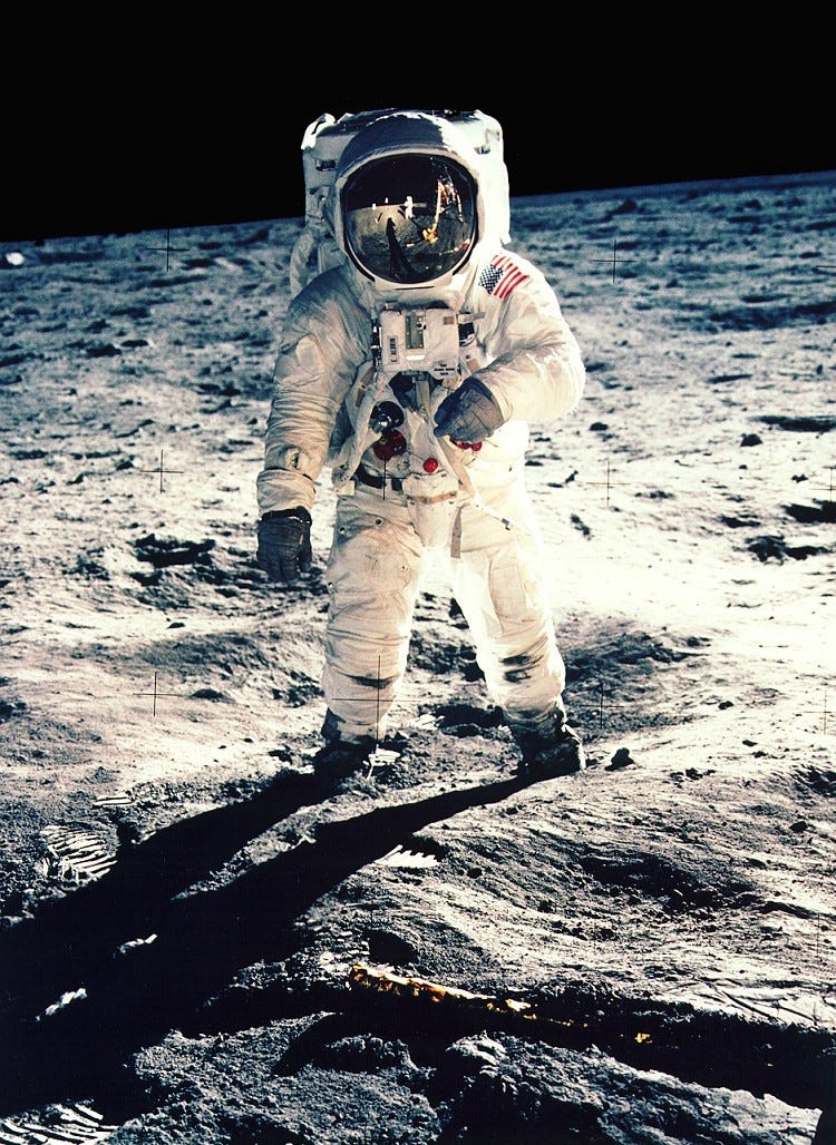 “Aldrin poses for portrait” via NASA